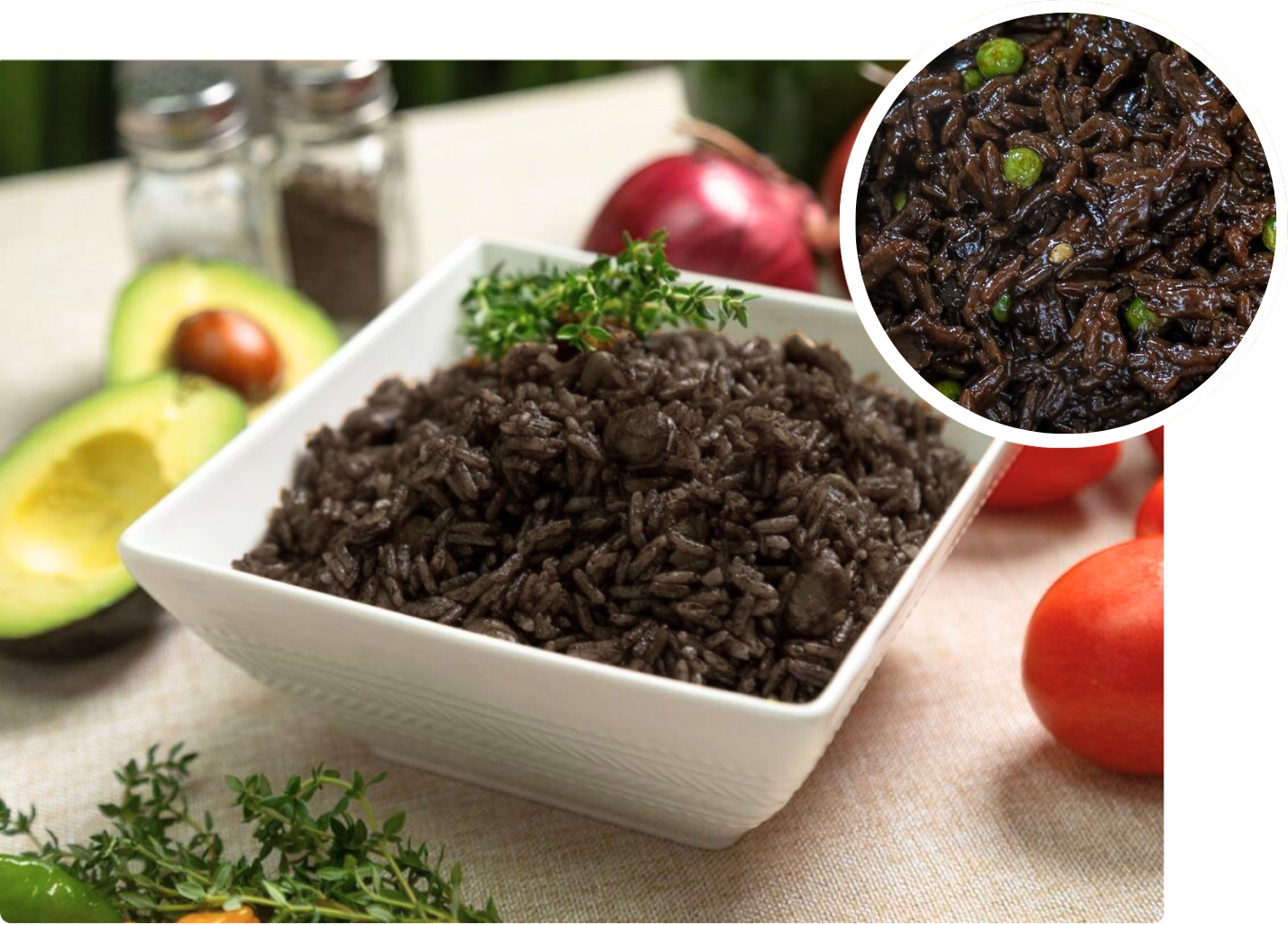 : A deep, dark bowl of traditional Riz Djondjon, achieving its iconic black color and smoky aroma